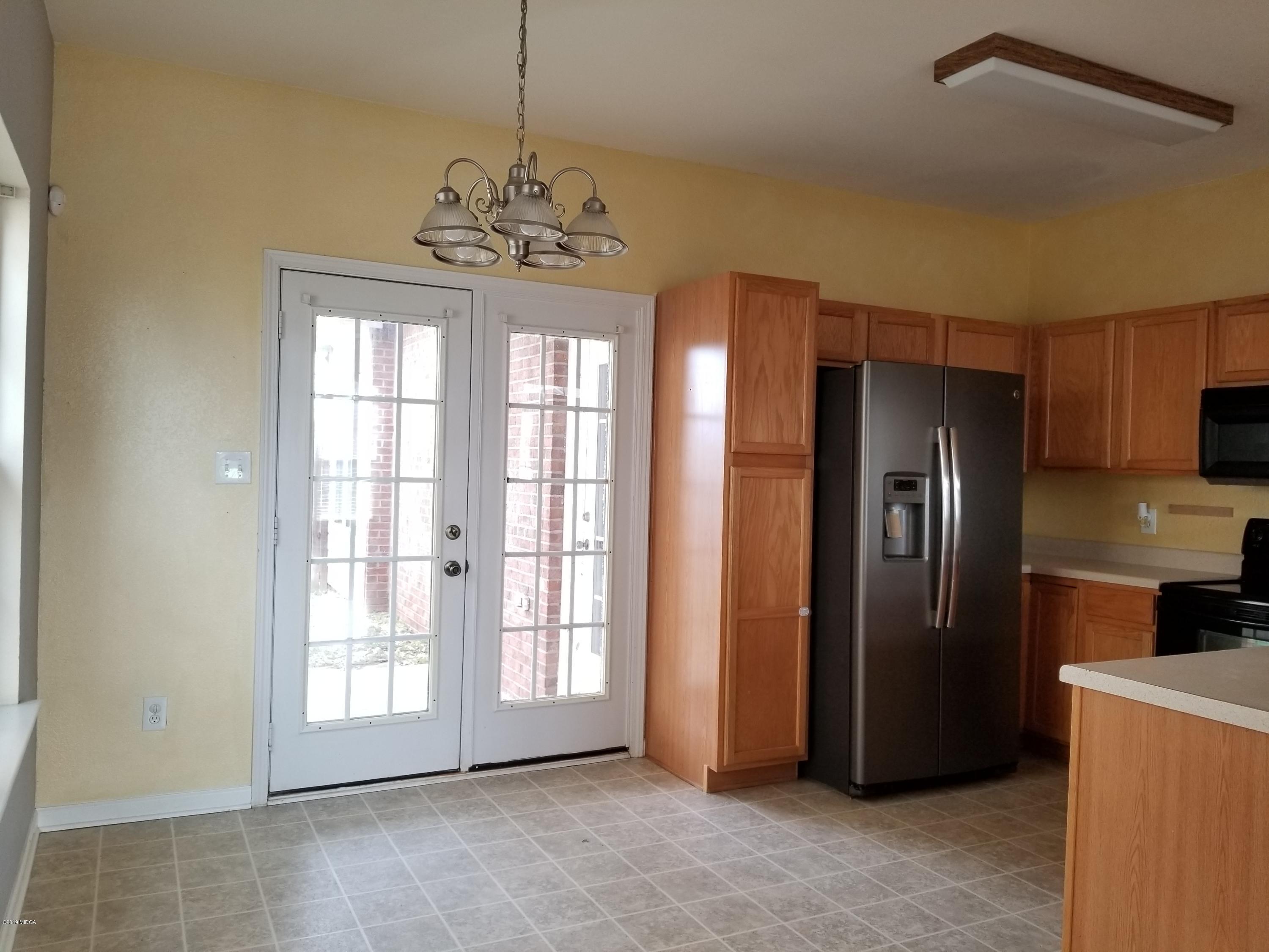 425 Bob White Road Macon, GA 31216 - Photo 15 of 20 a view of an empty room with a window