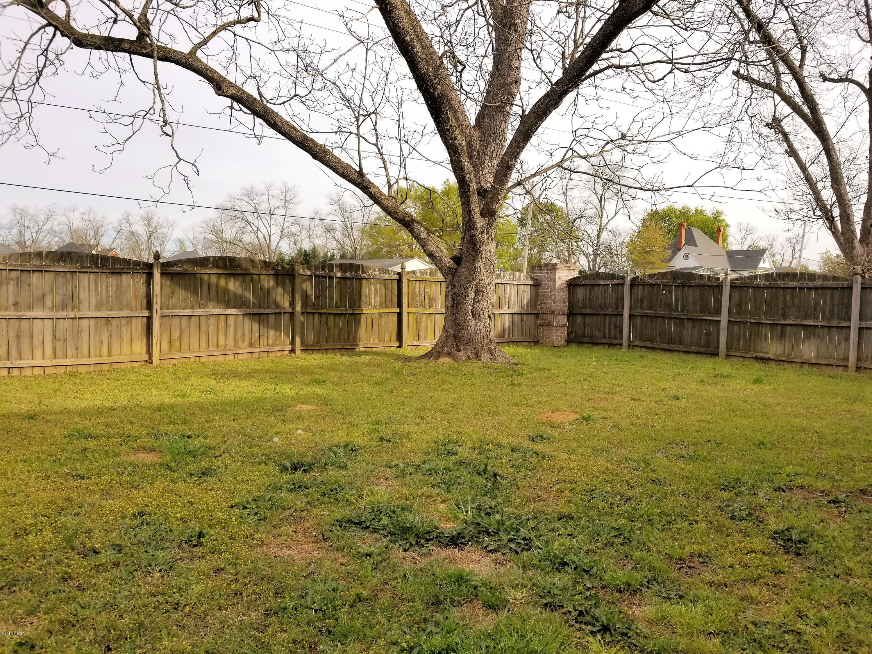 425 Bob White Road Macon, GA 31216 - Photo 16 of 20 a view of a yard with a tree