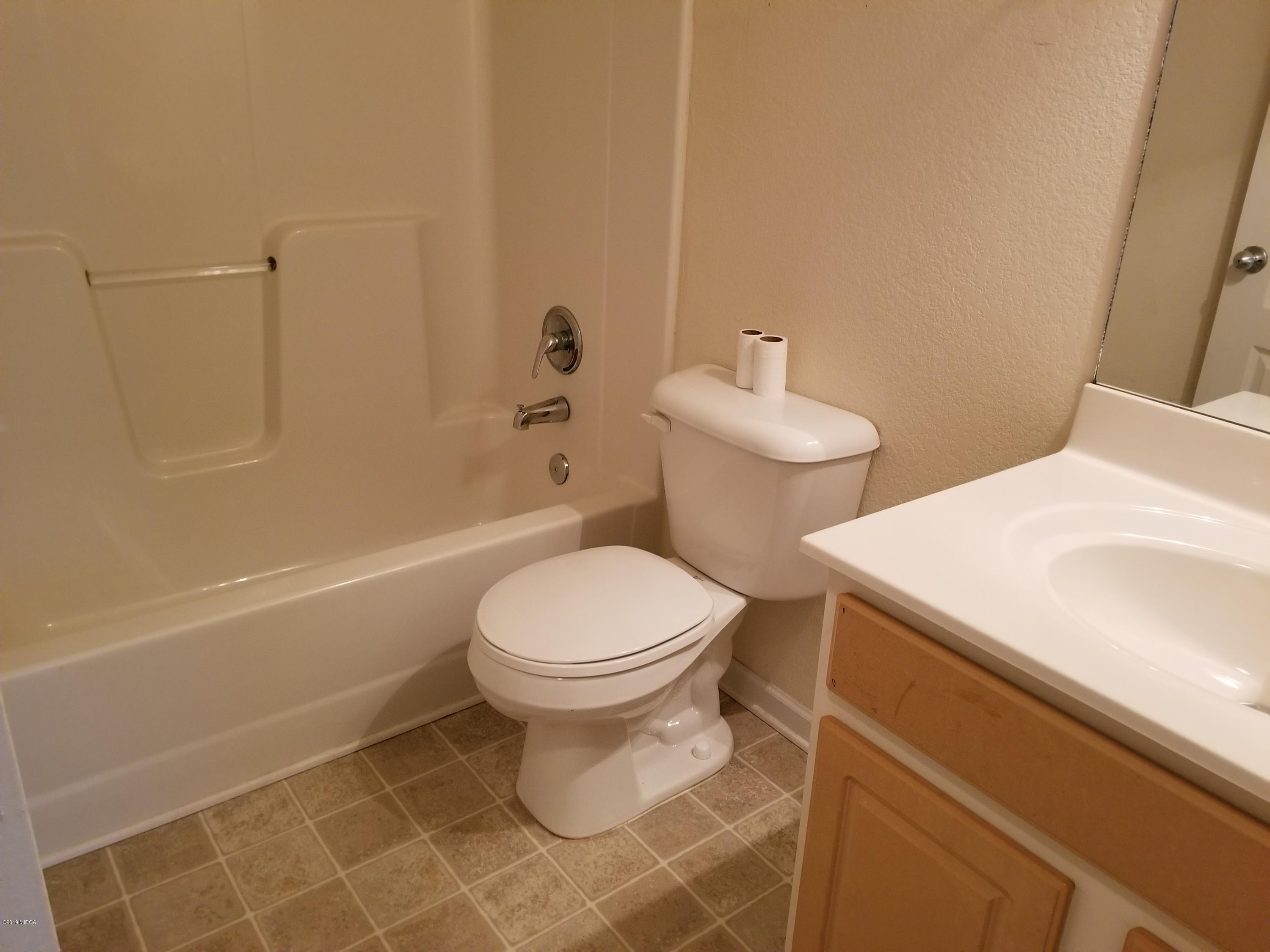425 Bob White Road Macon, GA 31216 - Photo 17 of 20 a bathroom with a toilet a sink and bathtub