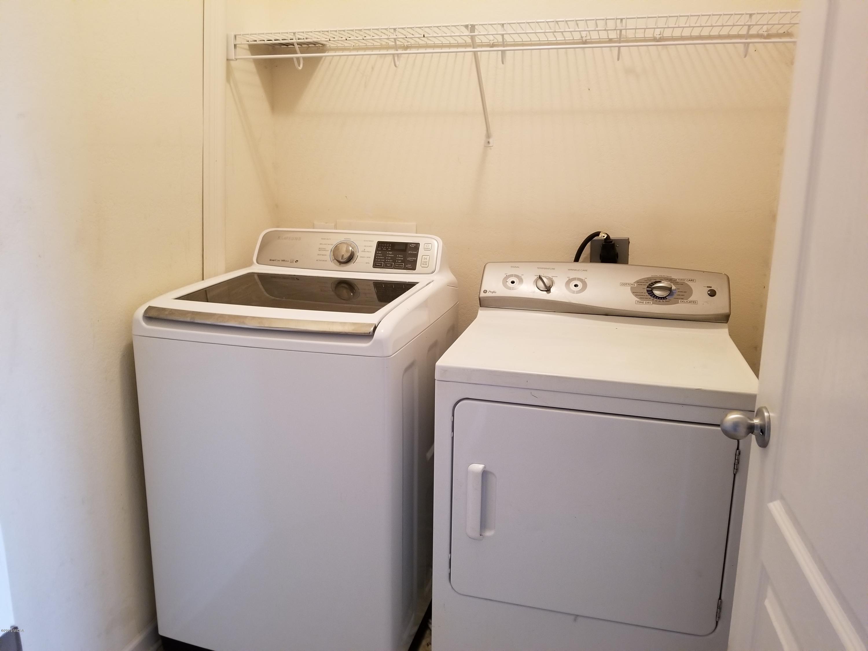 425 Bob White Road Macon, GA 31216 - Photo 18 of 20 a utility room with dryer and washer