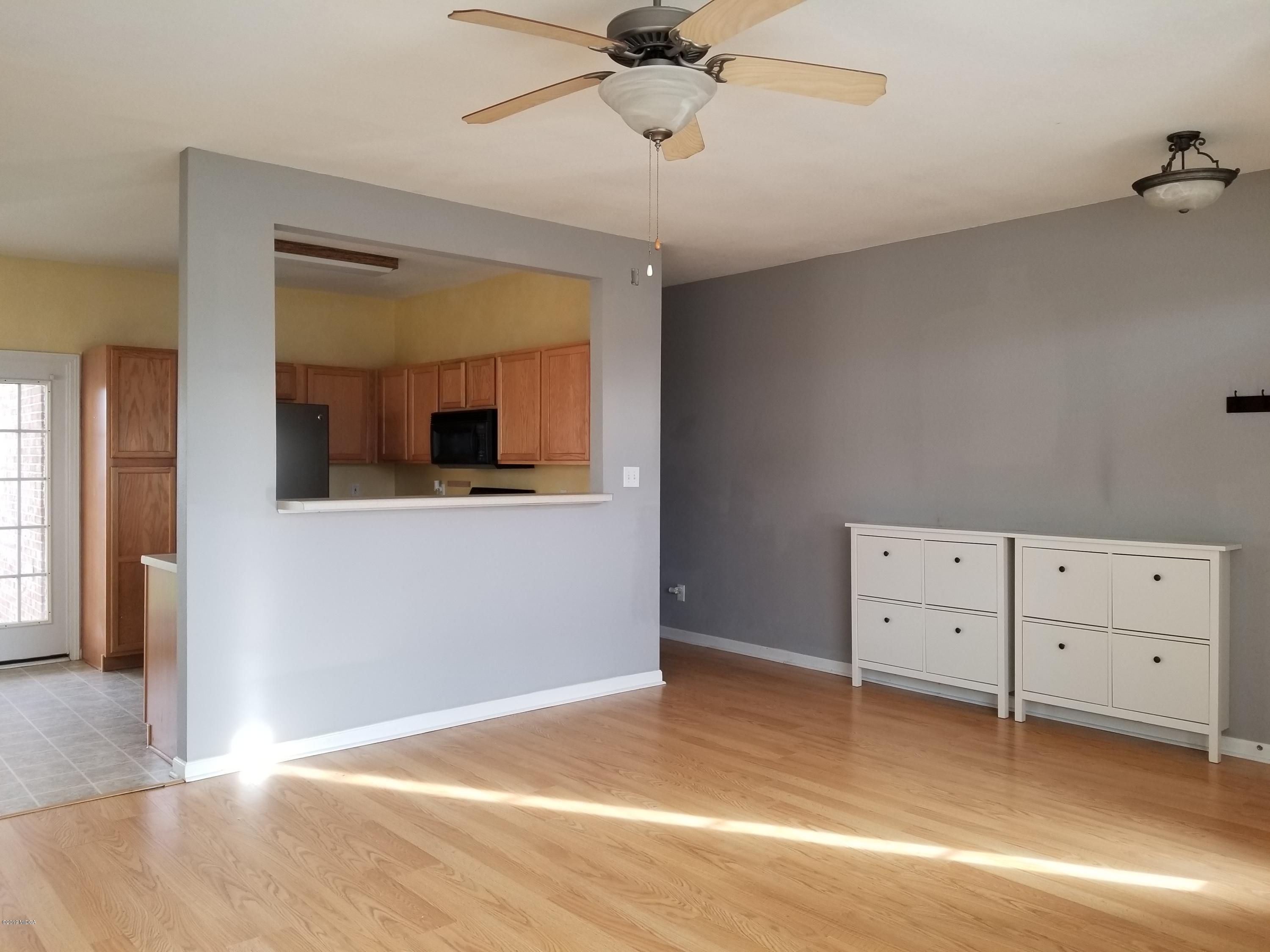 425 Bob White Road Macon, GA 31216 - Photo 9 of 20 a view of an empty room with cabinet and a window