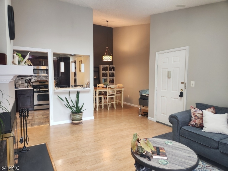 330 Penns Way Bernards, NJ 07920 - Photo 2 of 13 a living room with furniture and wooden floor