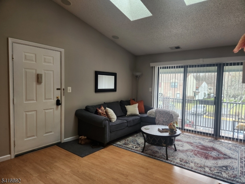 330 Penns Way Bernards, NJ 07920 - Photo 3 of 13 a living room with furniture and a window