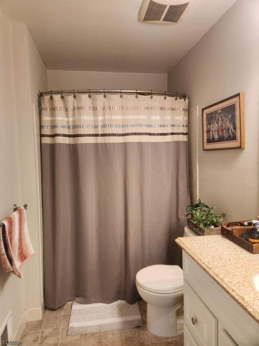 330 Penns Way Bernards, NJ 07920 - Photo 8 of 13 a bathroom with a granite countertop sink and a toilet