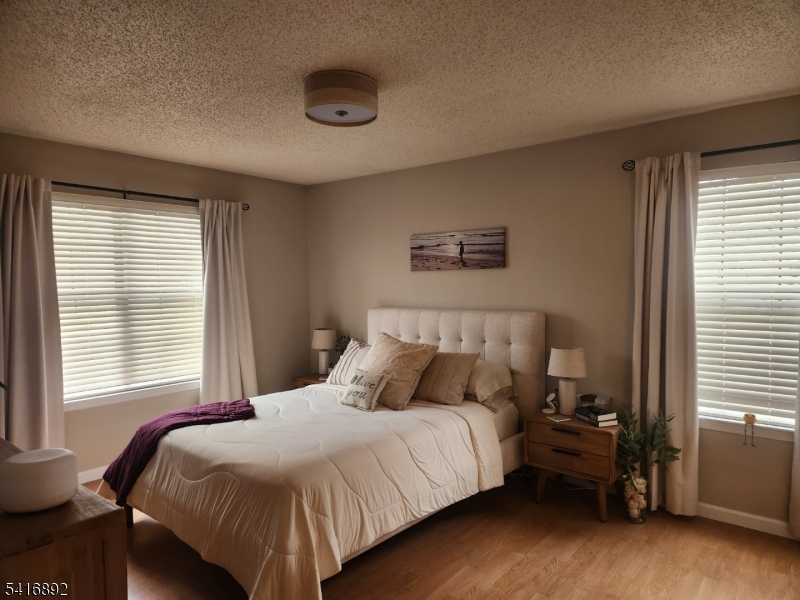 330 Penns Way Bernards, NJ 07920 - Photo 9 of 13 a bedroom with a bed and a window