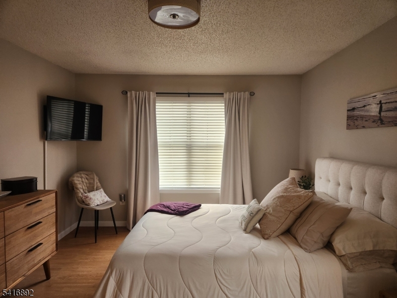 330 Penns Way Bernards, NJ 07920 - Photo 10 of 13 a bedroom with a bed and a window