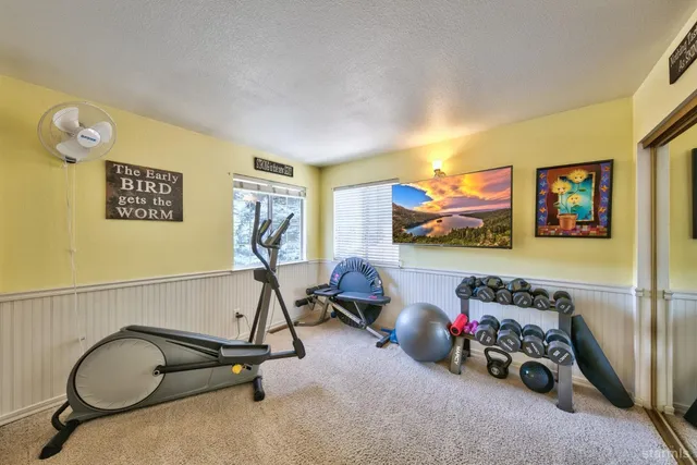 a view of a room with gym equipment