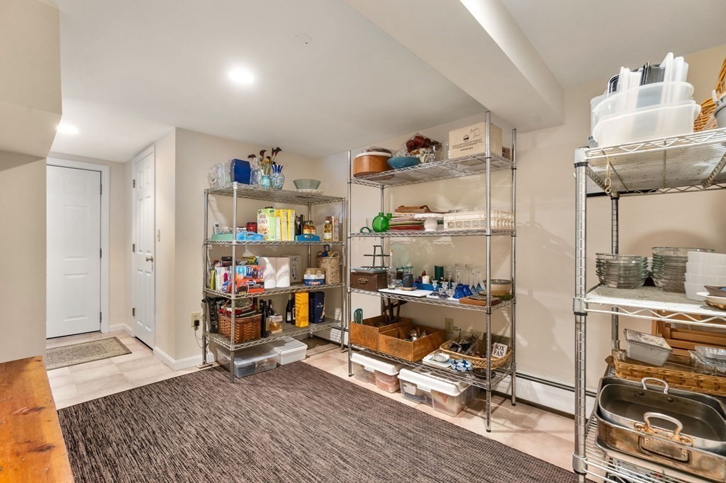 78 Addington Road Brookline, MA 02445 - Photo 26 of 30 a view of a workspace with furniture and toys