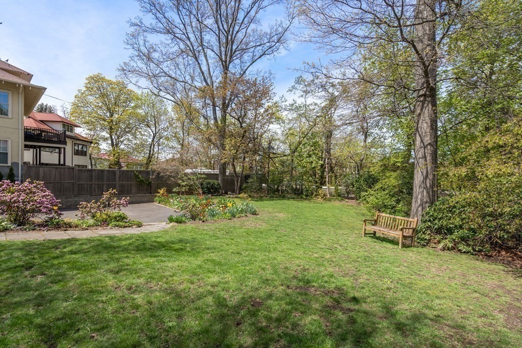 78 Addington Road Brookline, MA 02445 - Photo 5 of 30 a backyard of a house with lots of green space
