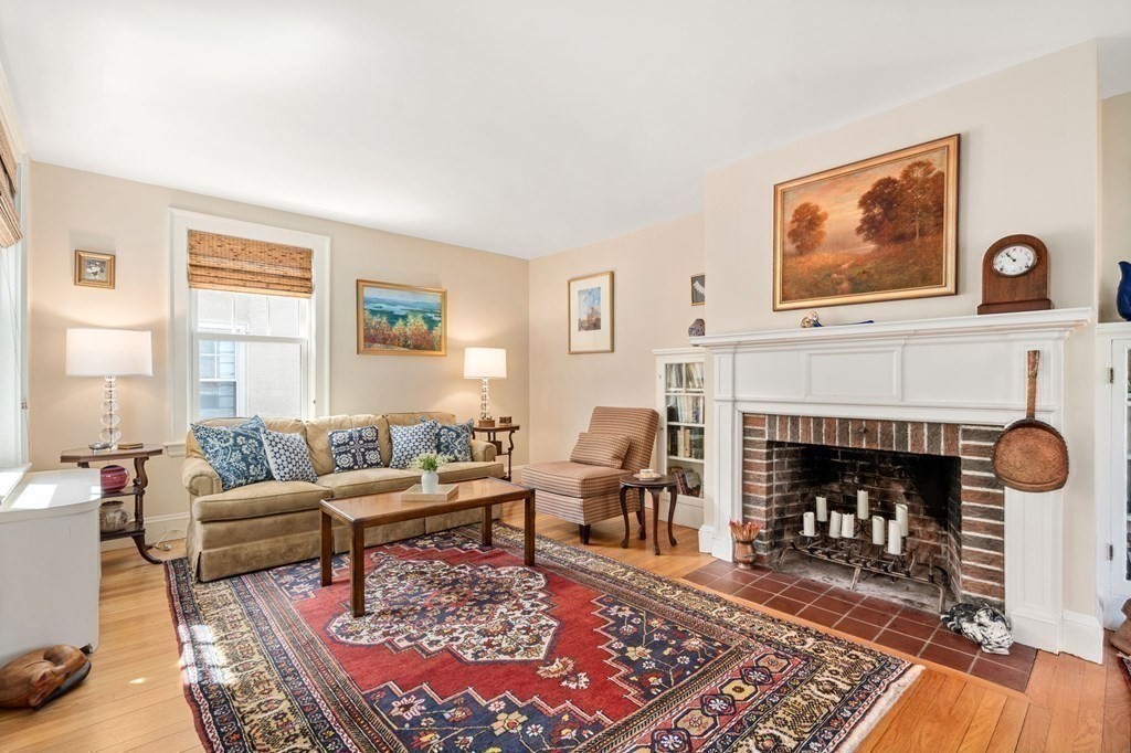 78 Addington Road Brookline, MA 02445 - Photo 10 of 30 a living room with furniture and a fireplace
