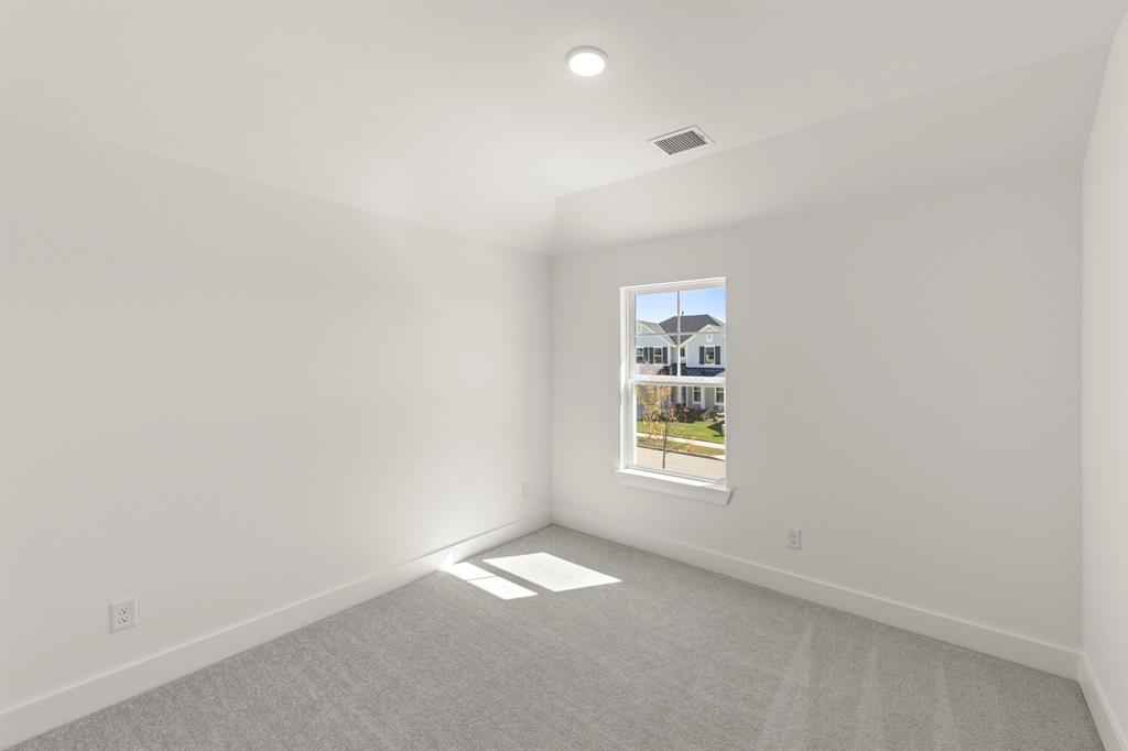 4100 Explorer Way McKinney, TX 75071 - Photo 22 of 27 an empty room with a window