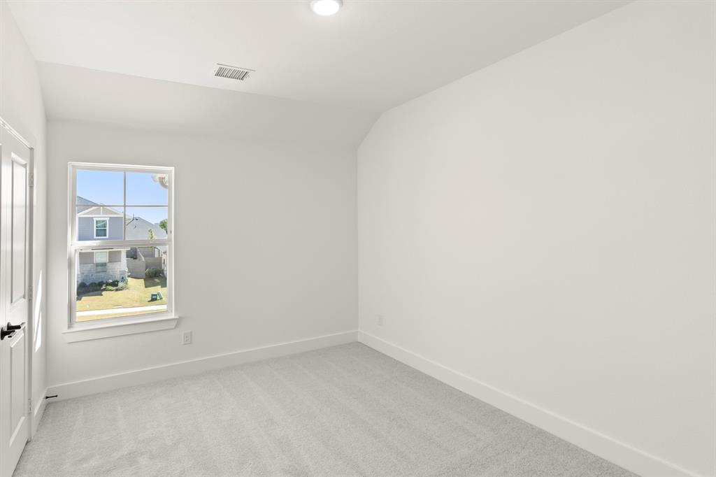 4100 Explorer Way McKinney, TX 75071 - Photo 24 of 27 an empty room with a window