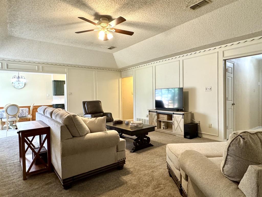 113 Northeast Timber Ridge Drive Burleson, TX 76028 - Photo 19 of 36 Primary Retreat is located OPPOSITE the Kitchen & Dining Area, across the Living Room...