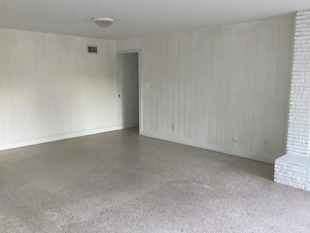 a living room with a fireplace