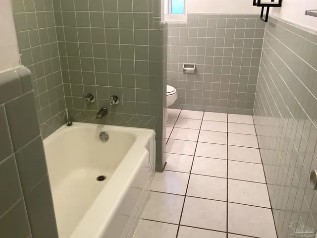 a bathroom with a bathtub