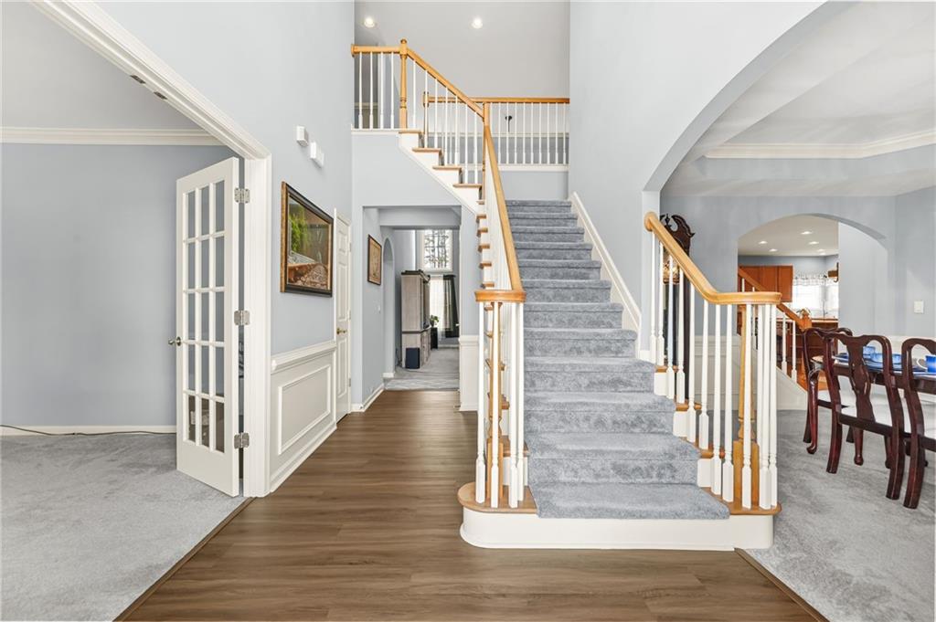 1203 Big Tree Pointe Villa Rica, GA 30180 - Photo 3 of 42 a view of entryway and hall with wooden floor