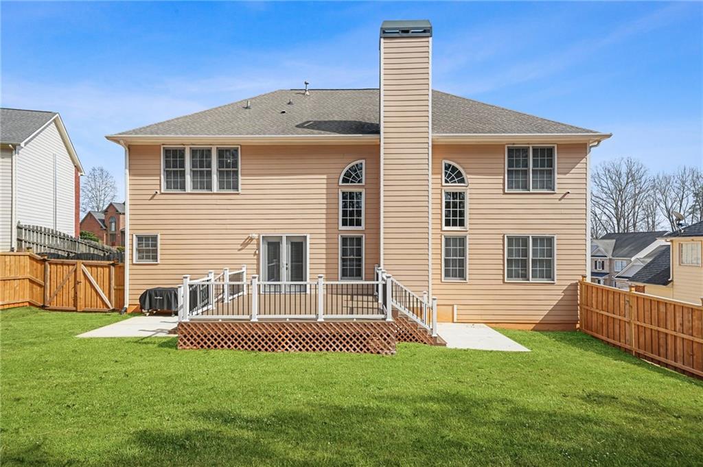 1203 Big Tree Pointe Villa Rica, GA 30180 - Photo 40 of 42 a front view of a house with a yard