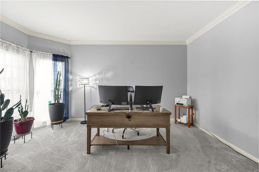 1203 Big Tree Pointe Villa Rica, GA 30180 - Photo 4 of 42 a living room with furniture and a flat screen tv