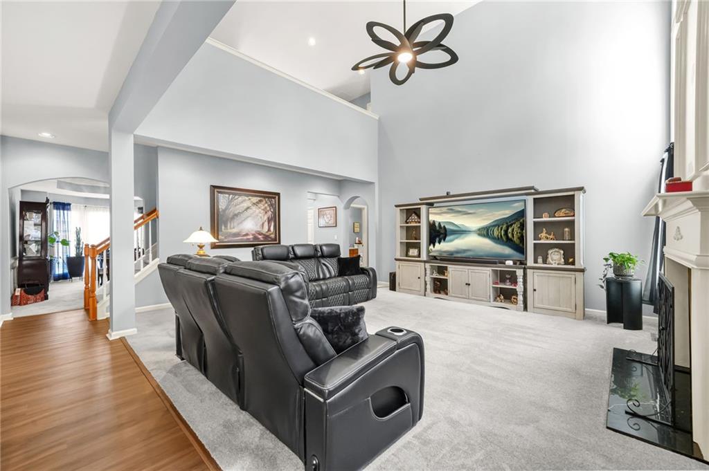 1203 Big Tree Pointe Villa Rica, GA 30180 - Photo 8 of 42 a living room with furniture and a wooden floor