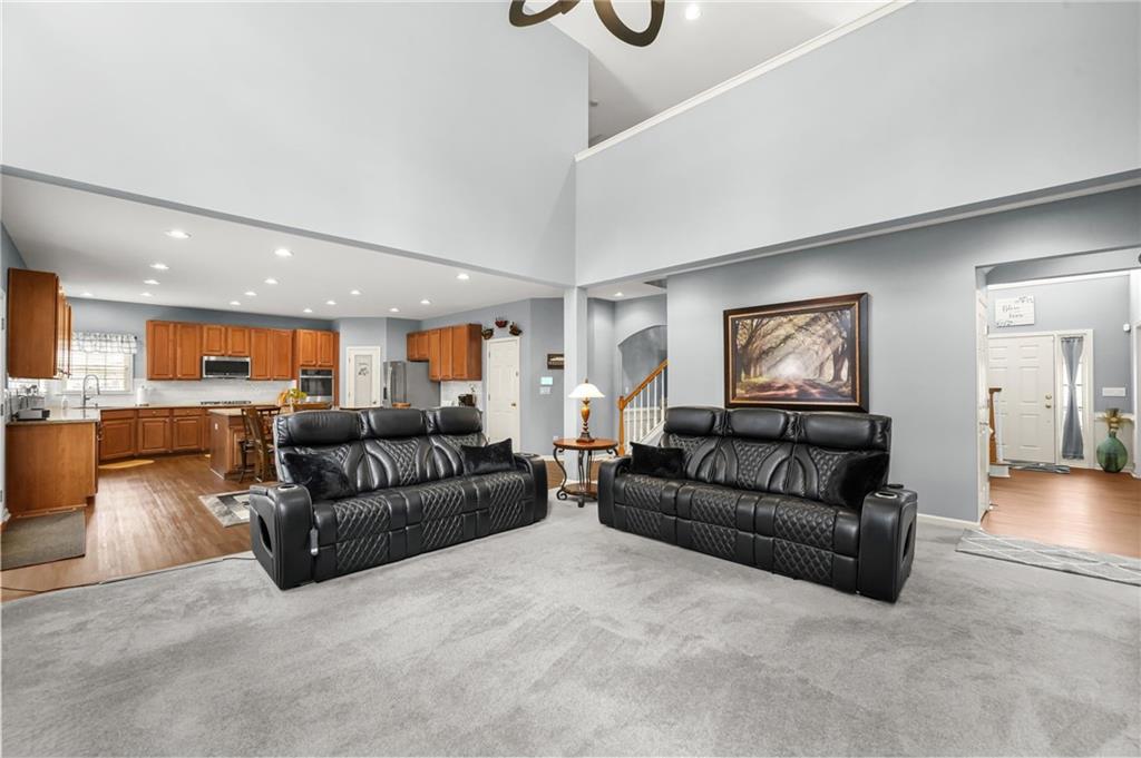 1203 Big Tree Pointe Villa Rica, GA 30180 - Photo 9 of 42 a living room with furniture and a view of kitchen