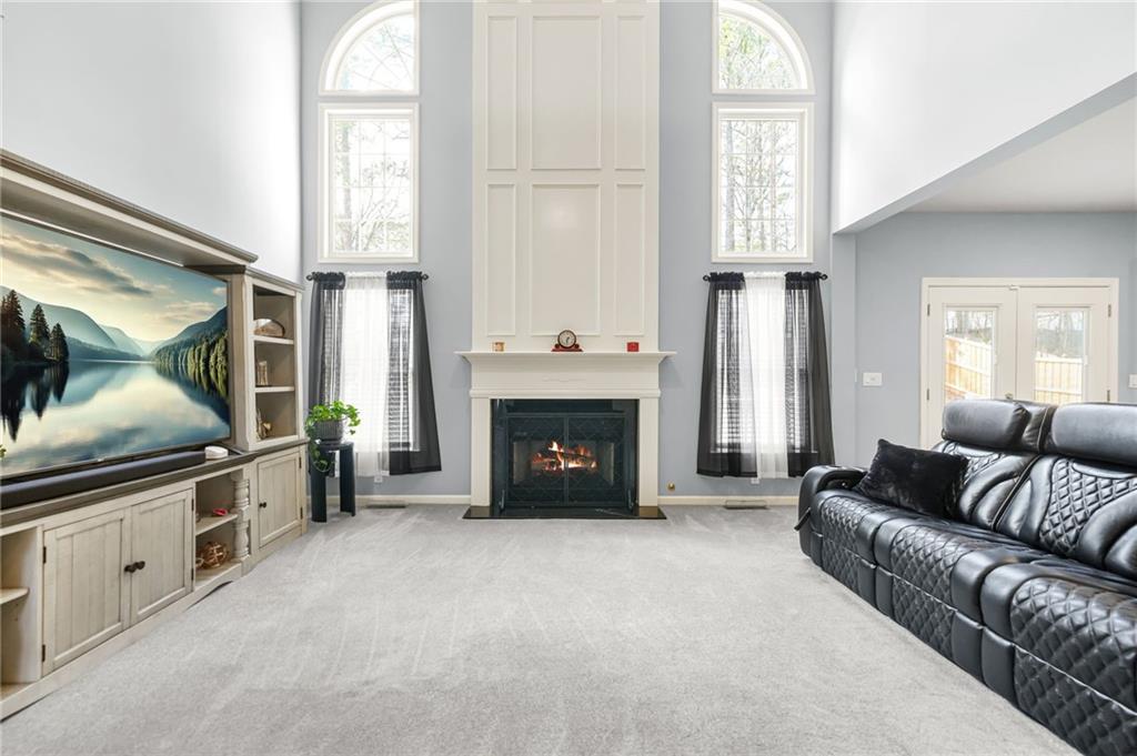 1203 Big Tree Pointe Villa Rica, GA 30180 - Photo 10 of 42 a living room with furniture and a fireplace