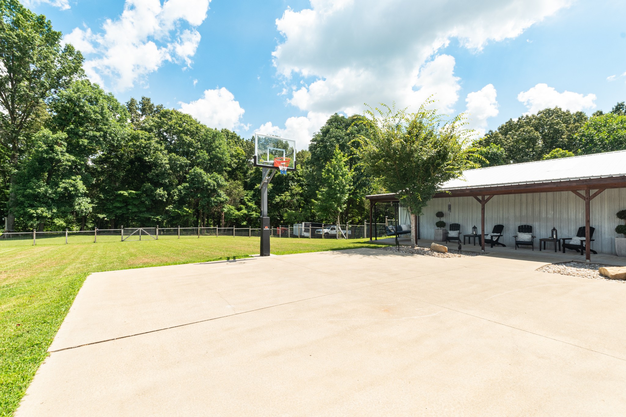 122 West Harper Road Portland, TN 37148 - Photo 60 of 74 a view of a house with swimming pool and a yard