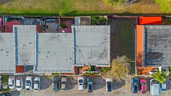 an aerial view of a building with outdoor space