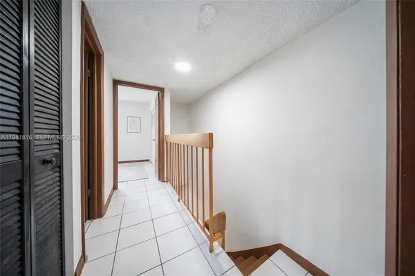 a view of a hallway with entryway