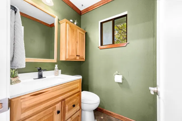 a bathroom with a sink and a toilet