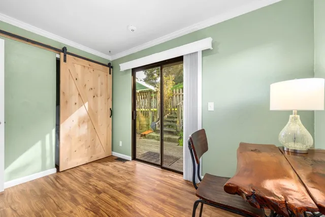 a workspace with furniture and a window