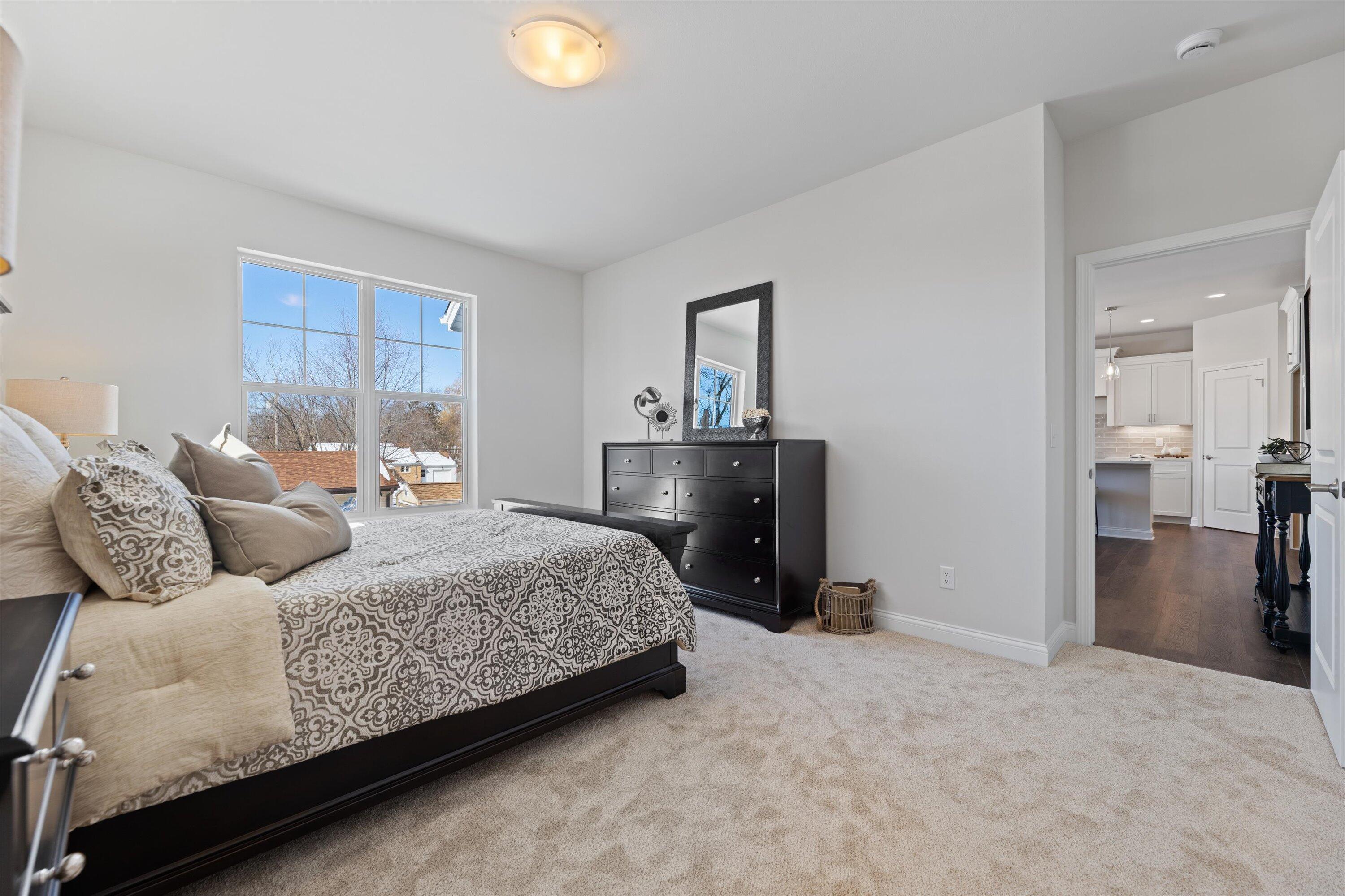 327 Sandy Circle Pewaukee, WI 53072 - Photo 26 of 40 Owner's Bedroom
