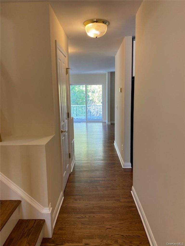51 Winding Ridge Road White Plains, NY 10603 - Photo 11 of 30 a view of hallway with wooden floor
