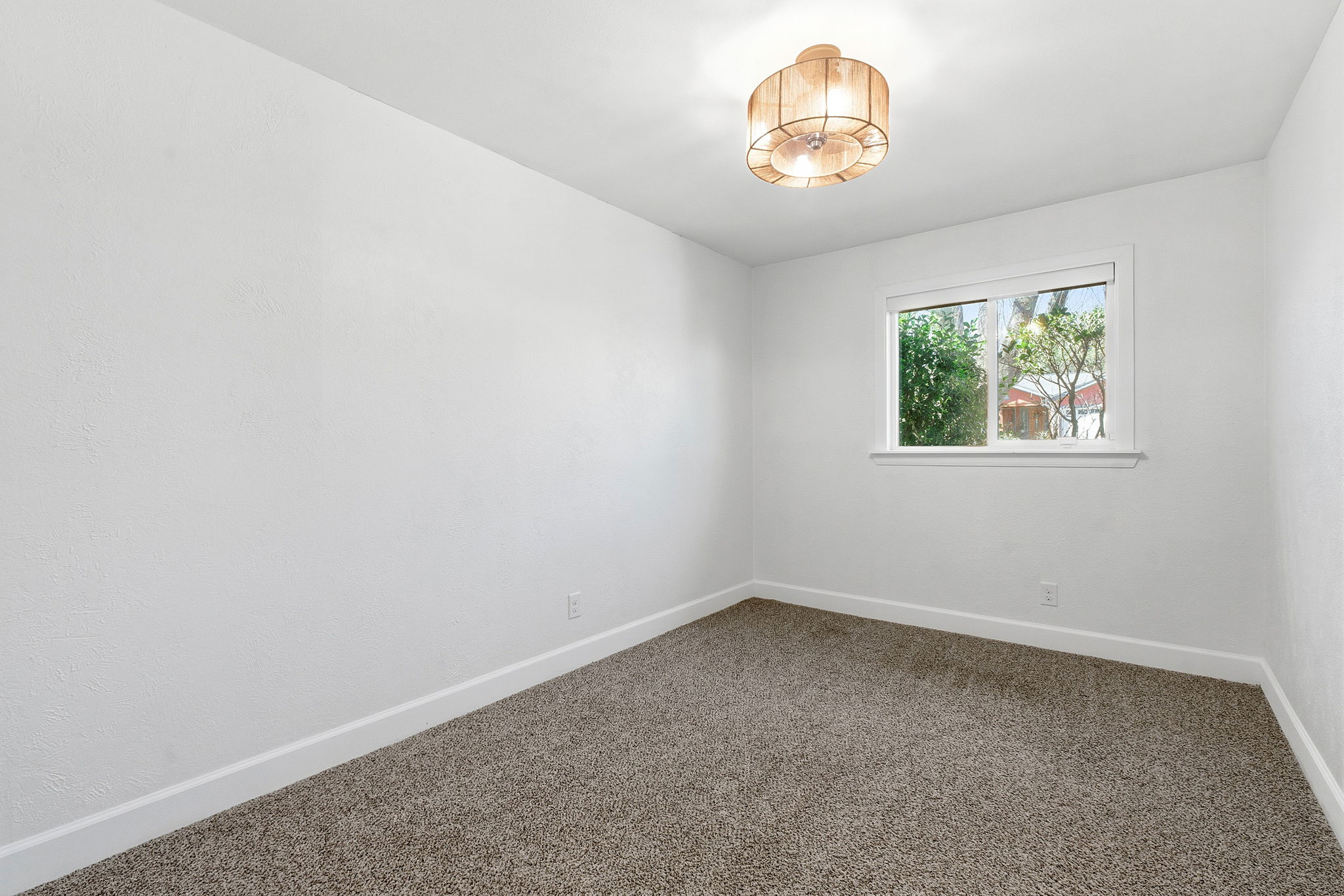 7105 Windrift Way Austin, TX 78745 - Photo 17 of 32 an empty room with a window