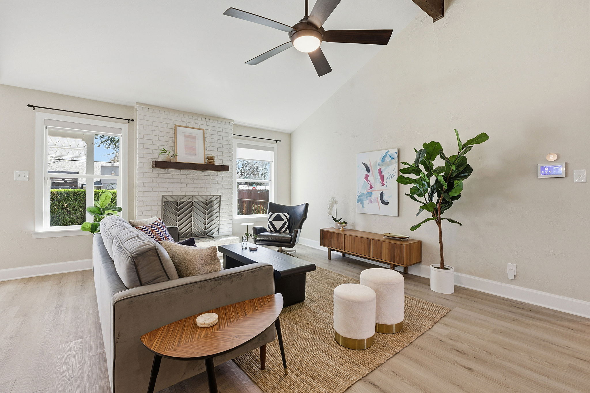 7105 Windrift Way Austin, TX 78745 - Photo 6 of 32 a living room with furniture and a potted plant