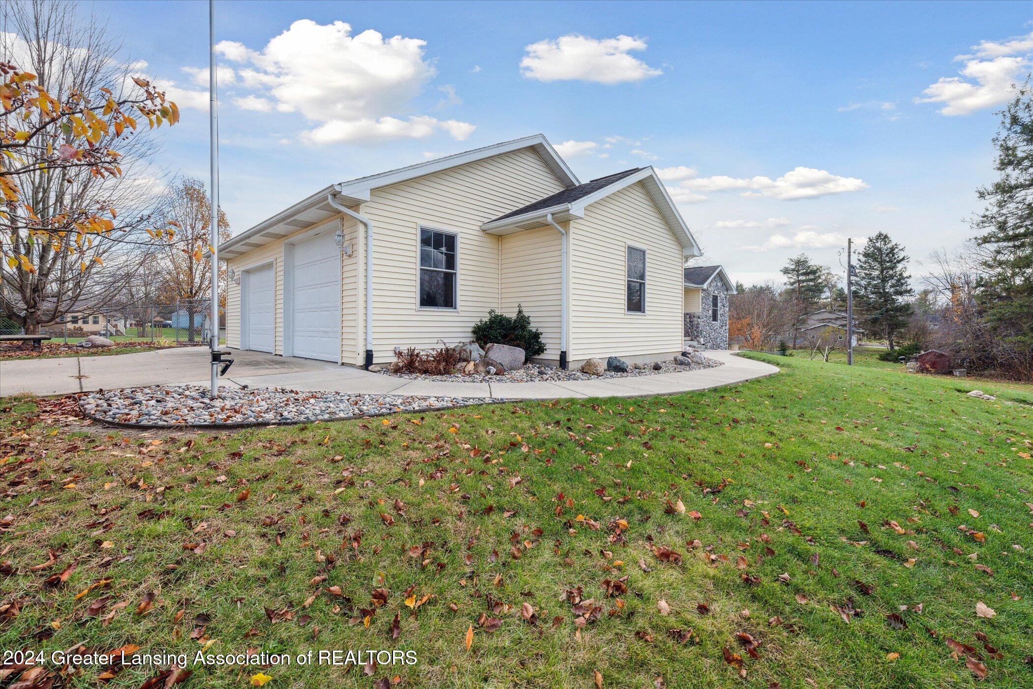 660 Creyts Road Dimondale, MI 48821 - Photo 2 of 59 02-660-Creyts-Rd-Dimondale-MI-48821-Wind