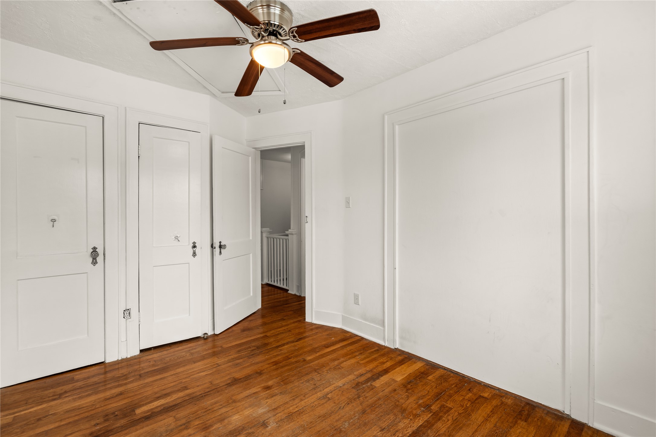 2202 West Main Street Houston, TX 77098 - Photo 28 of 32 a view of empty room with wooden floor