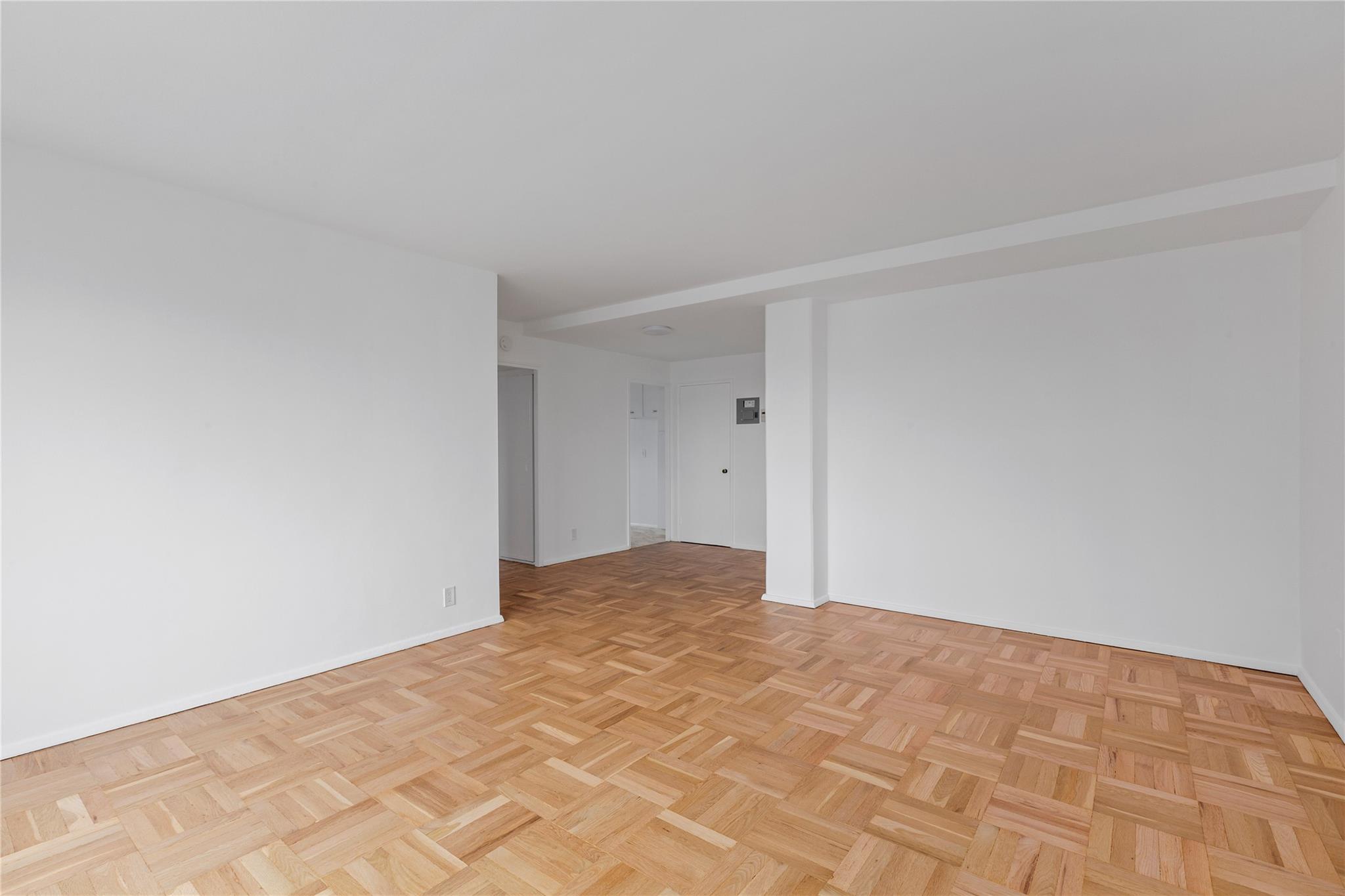 21-80 33rd Road, Unit 7D Queens, NY 11106 - Photo 4 of 12 a view of an empty room