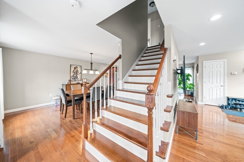 38 Renaud Street Fall River, MA 02721 - Photo 13 of 25 a view of entryway and hall with wooden floor