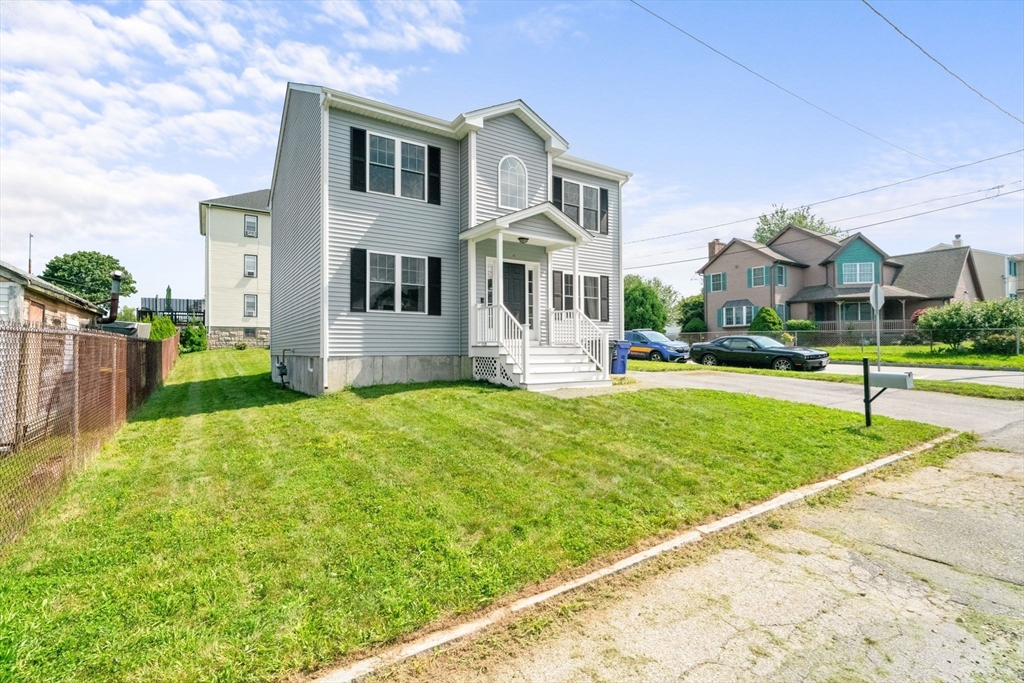 38 Renaud Street Fall River, MA 02721 - Photo 2 of 25 a front view of building with yard