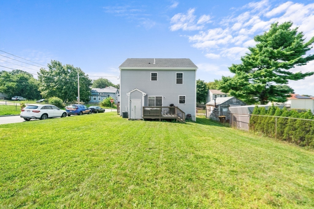 38 Renaud Street Fall River, MA 02721 - Photo 22 of 25 a front view of a house with a garden