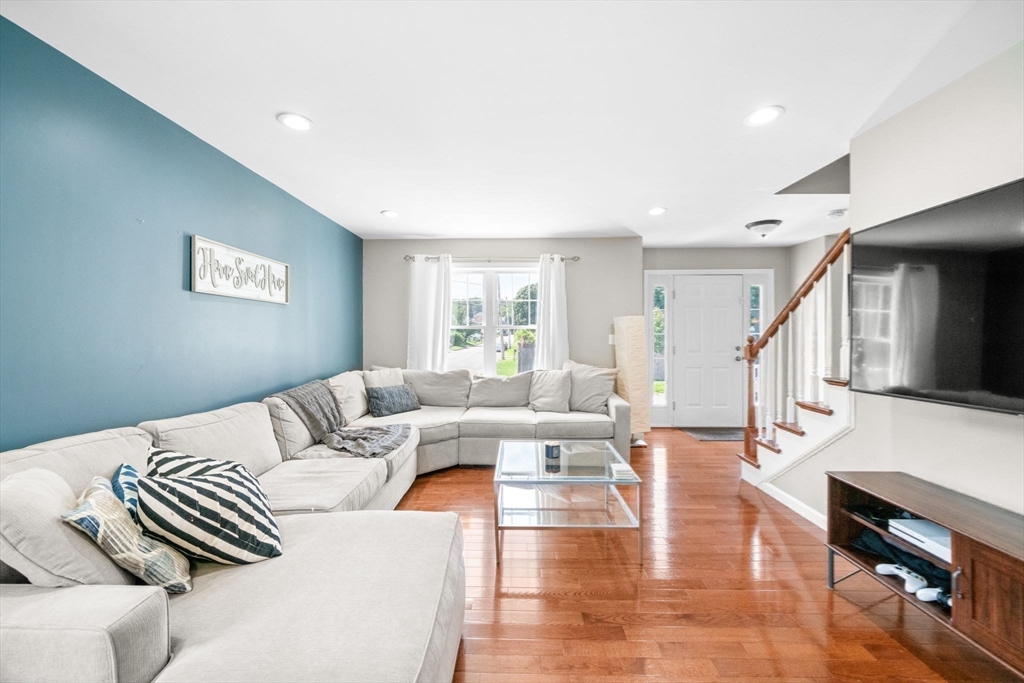 38 Renaud Street Fall River, MA 02721 - Photo 4 of 25 a living room with furniture and wooden floor