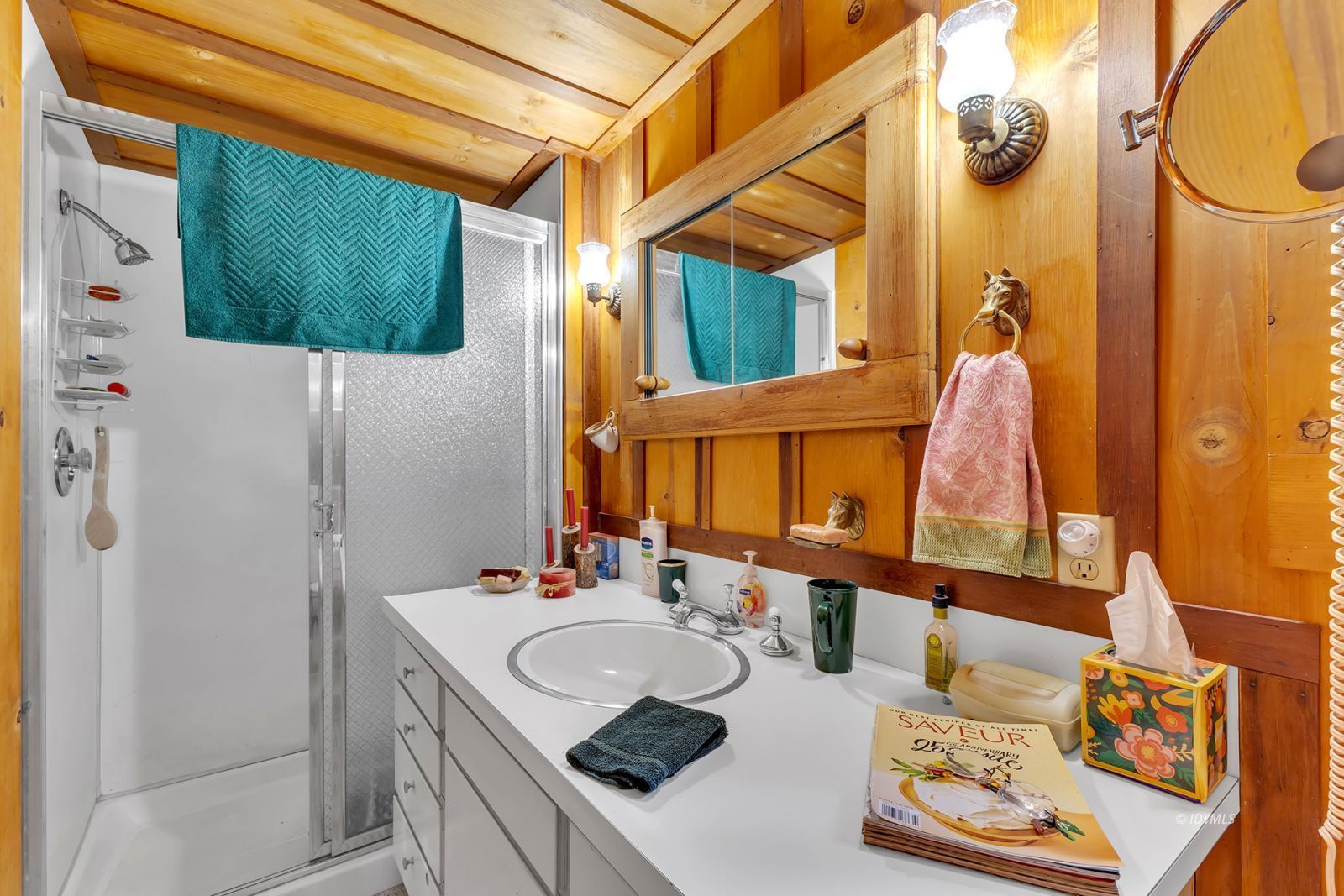 25100 Indian Rock Road Idyllwild, CA 92549 - Photo 53 of 75 a bathroom with a sink and a mirror