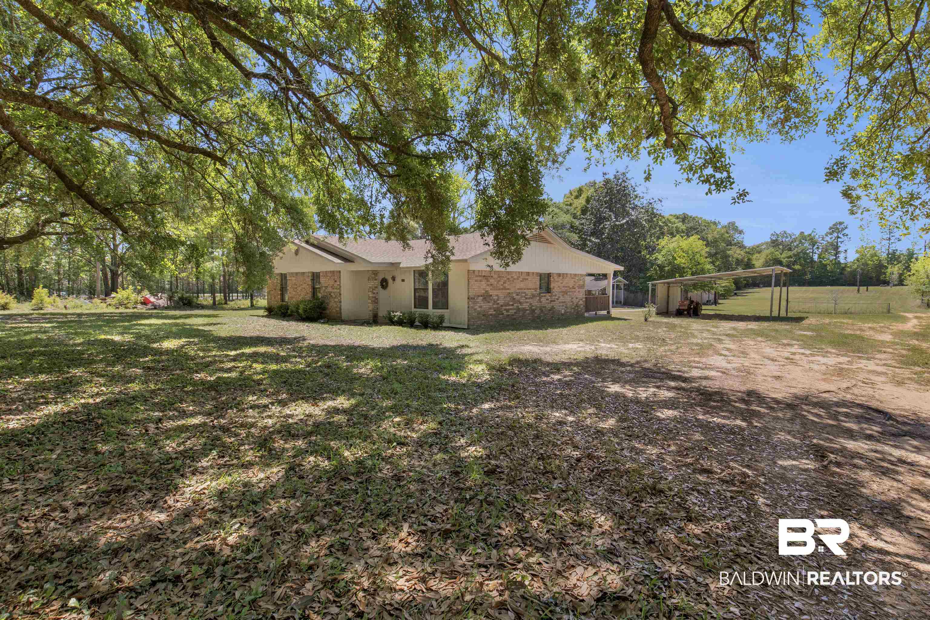 5665 Ulysses Road Eight Mile, AL 36613 - Photo 19 of 23 View of yard featuring fence and a detached carport