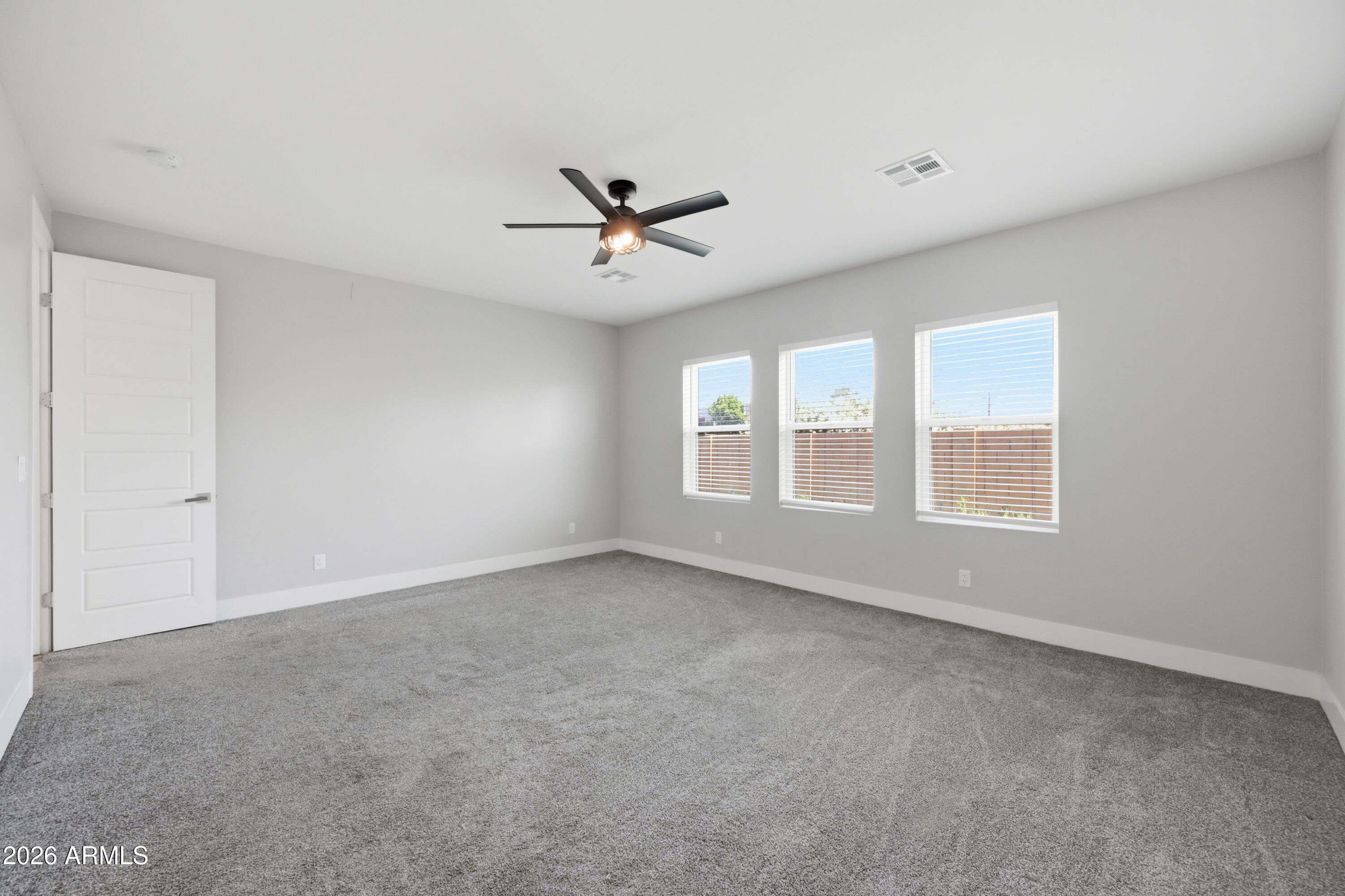 431 North Matlock Street Mesa, AZ 85203 - Photo 12 of 33 a view of an empty room with a window