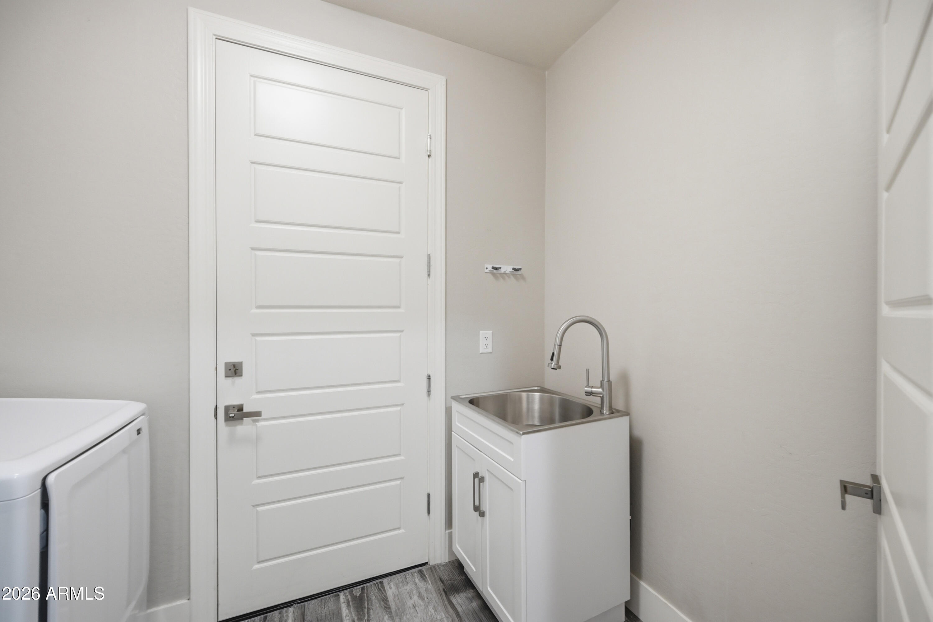 431 North Matlock Street Mesa, AZ 85203 - Photo 18 of 33 a bathroom with a sink and mirror