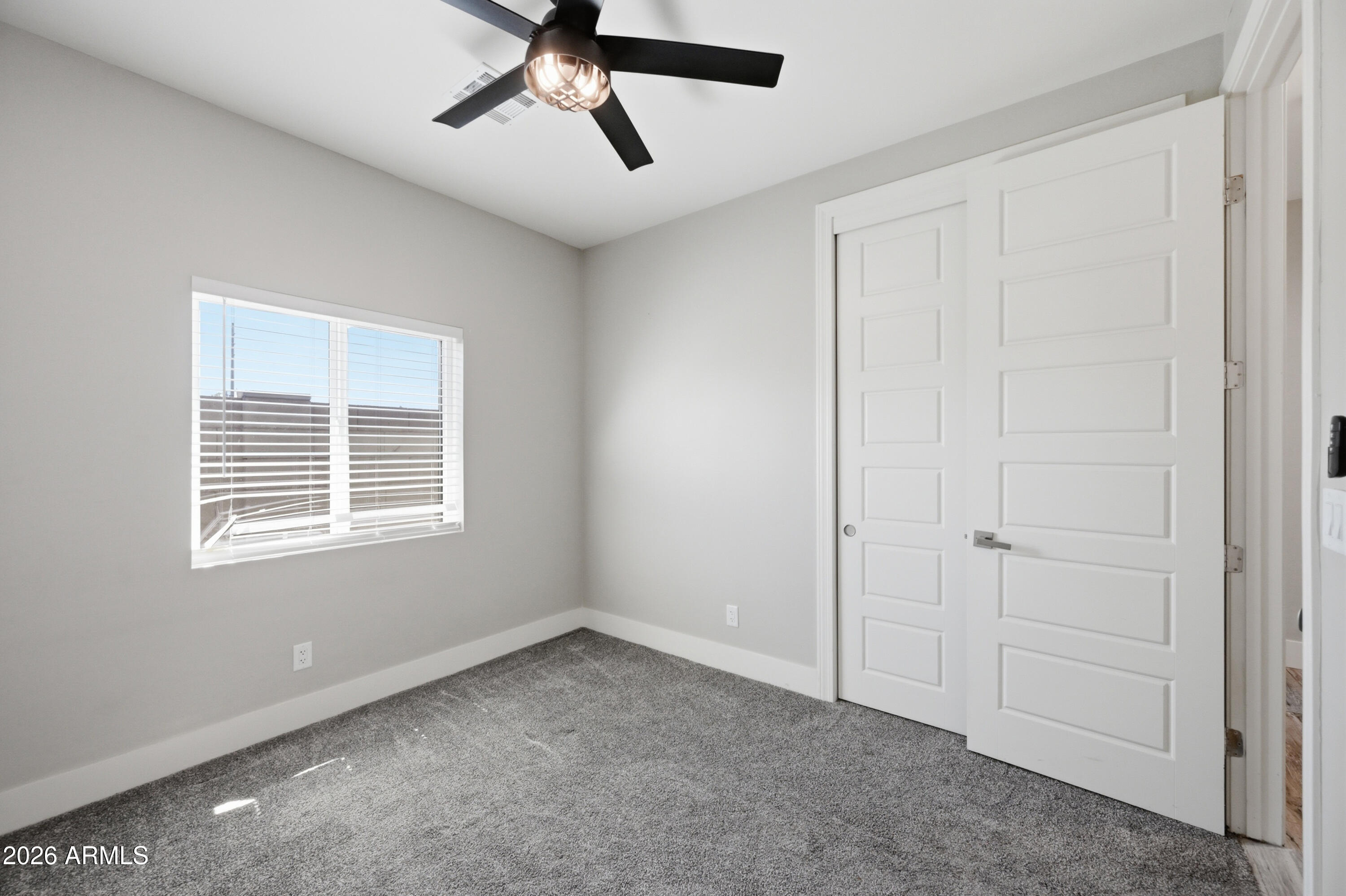 431 North Matlock Street Mesa, AZ 85203 - Photo 22 of 33 a view of an empty room with a window