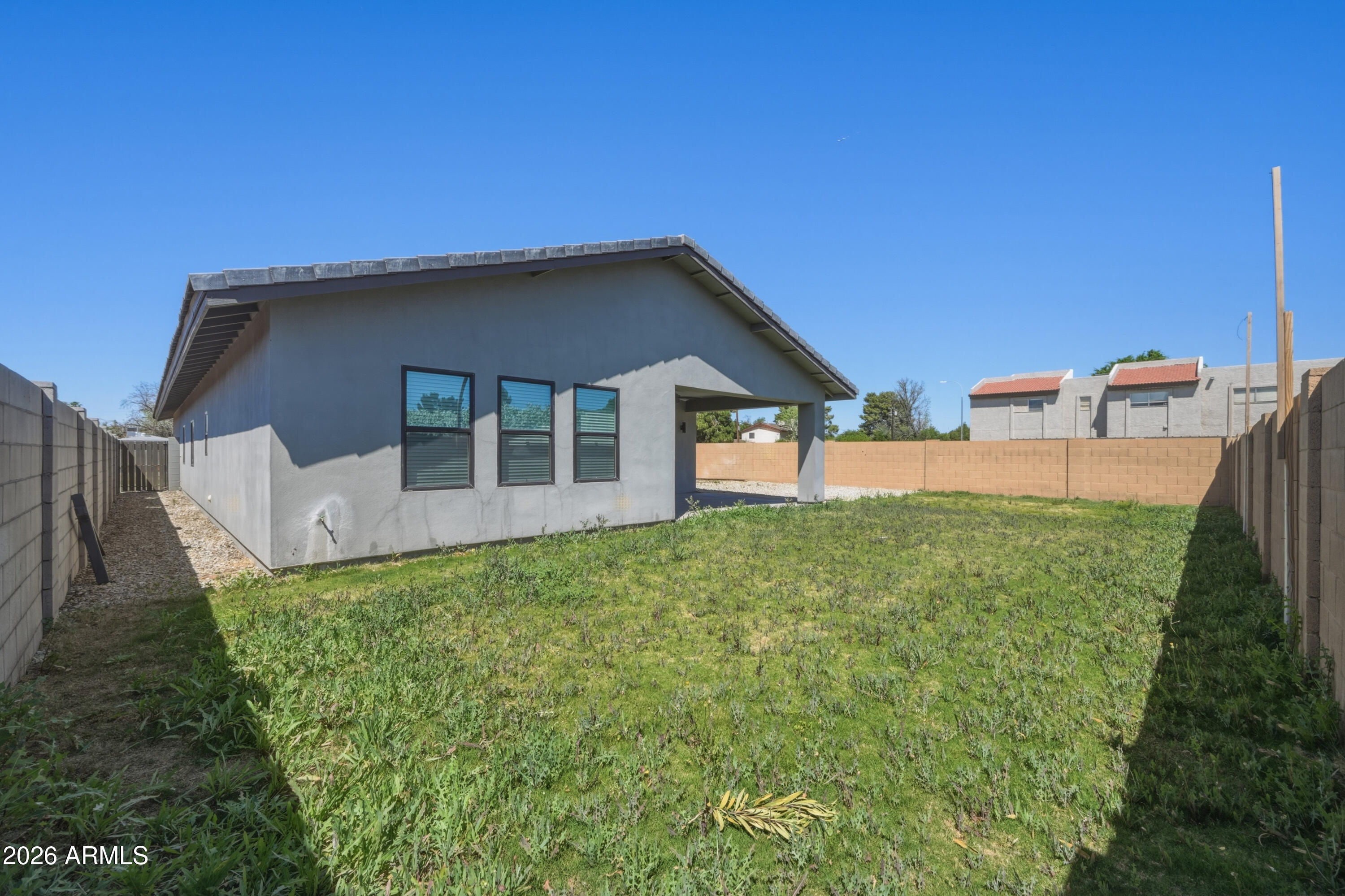 431 North Matlock Street Mesa, AZ 85203 - Photo 27 of 33 a house view with a garden space
