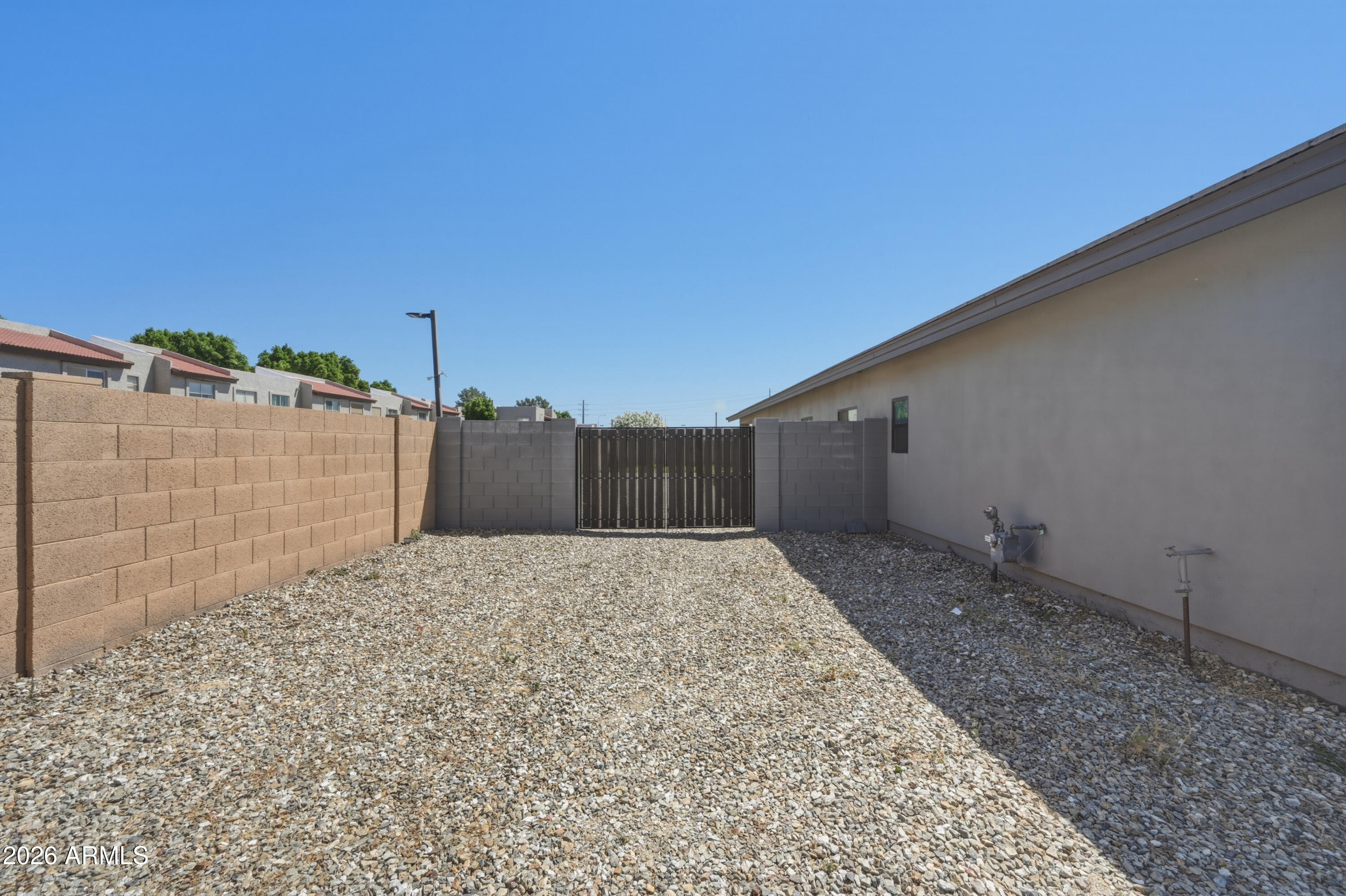 431 North Matlock Street Mesa, AZ 85203 - Photo 29 of 33 a backyard of a house
