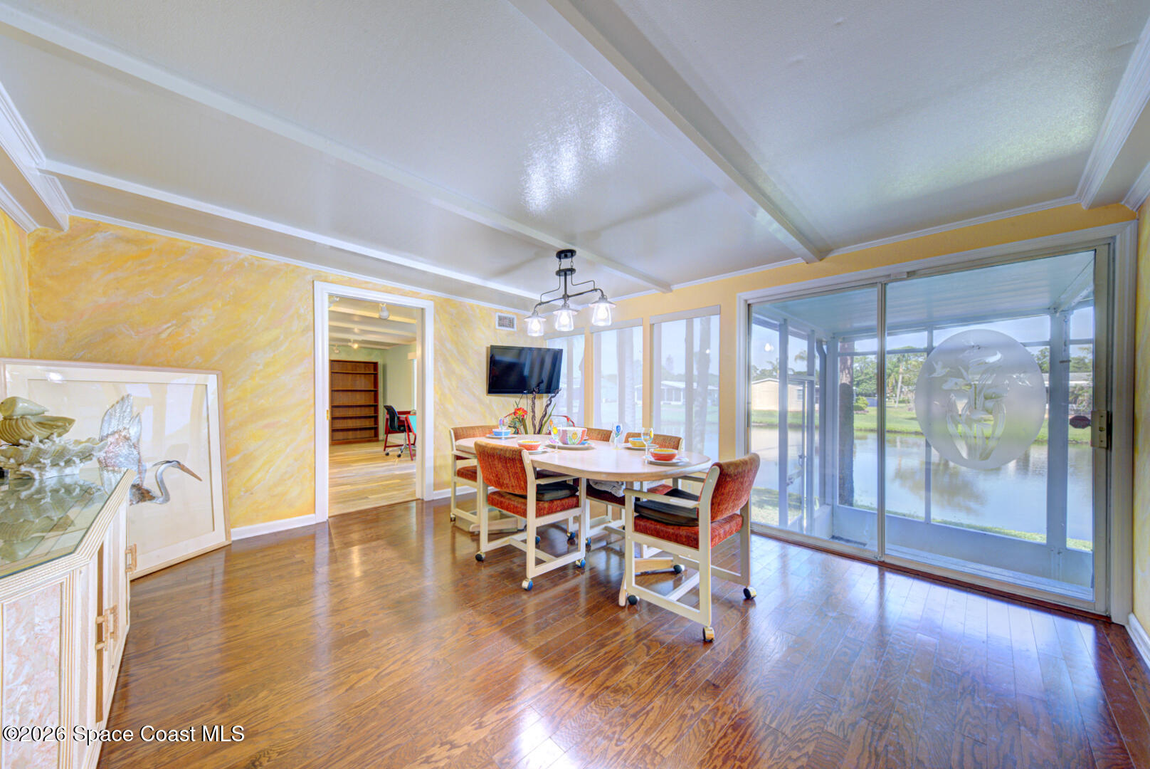 176 Woodsmill Boulevard, Unit 177 Cocoa, FL 32926 - Photo 34 of 63 32 family or game room with slider to po