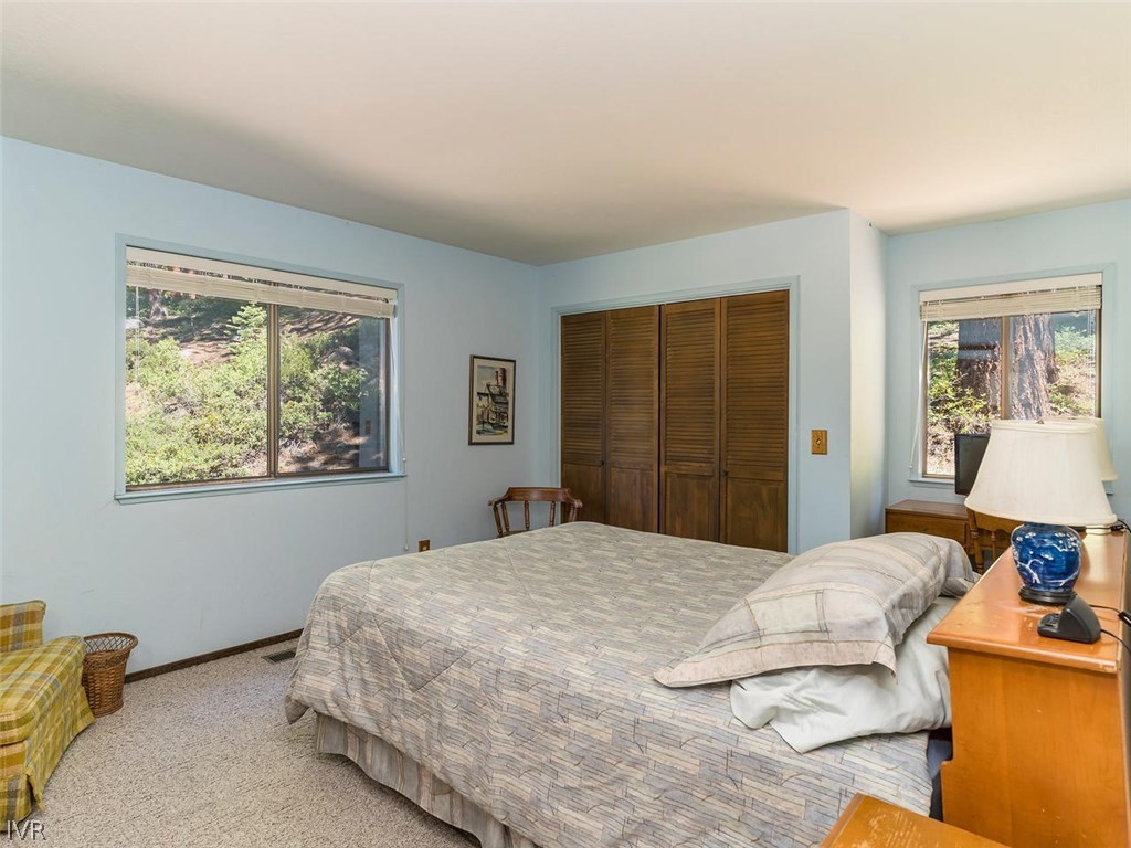 1004 Apollo Way Incline Village, NV 89451 - Photo 16 of 21 a bedroom with a bed and a window